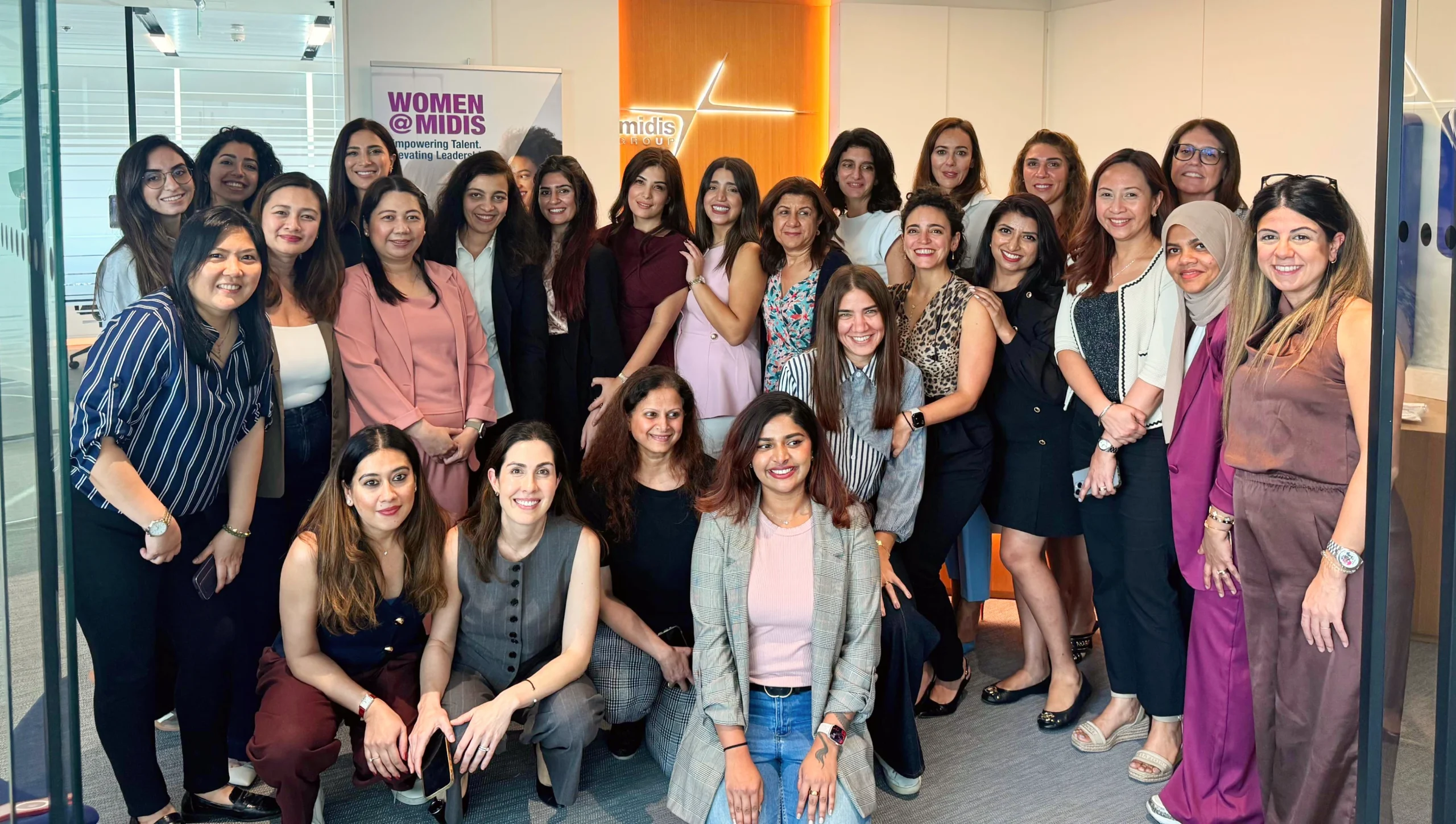 Group photograph taken at a women@midis event