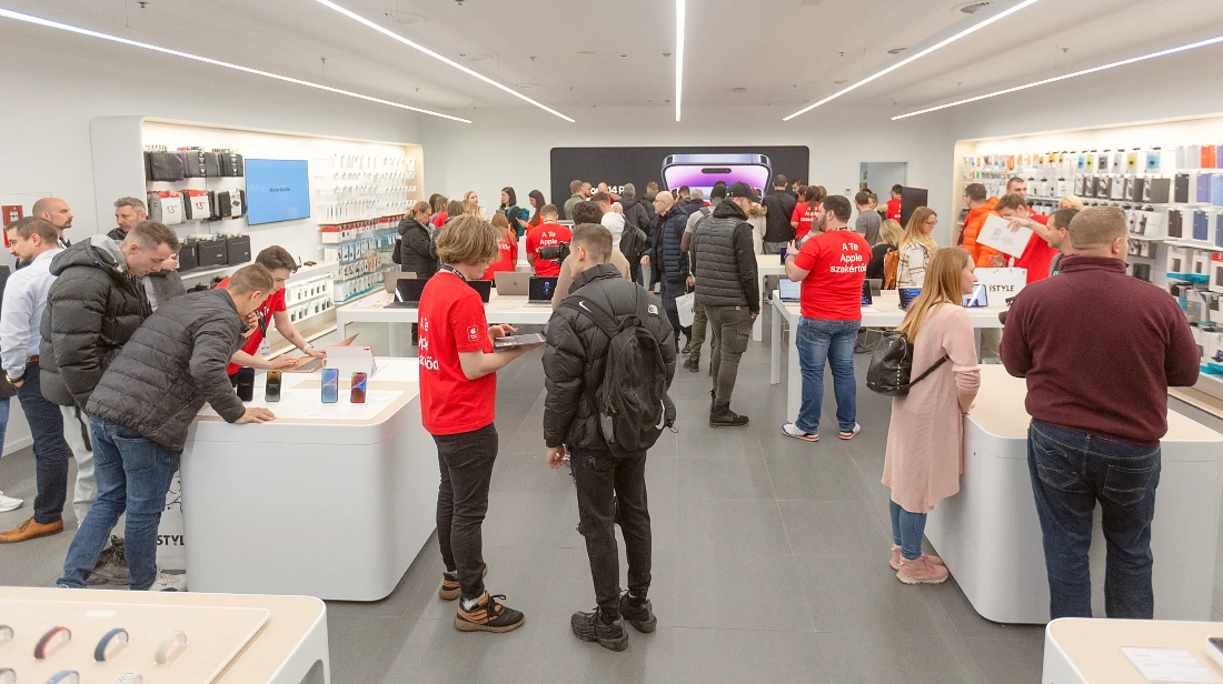 People at the grand opening of a hi tech retail site