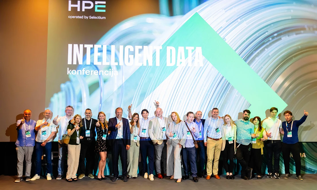 a large group of people are seen in a group photograph at a hi tech event